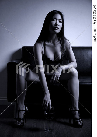 Sexy asian girl in underwear posing on sofa with - Stock Photo [63040594] -  PIXTA