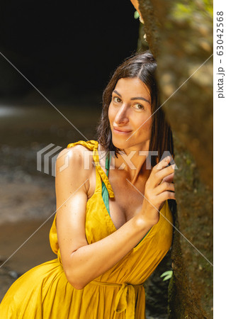 Positive delighted young beauty posing on camera Positive delighted young beauty posing on camera 63042568