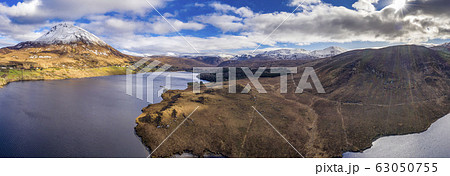Aerial view of Mount Errigal, the highest mountain in Donegal - Ireland Aerial view of Mount Errigal, the highest mountain in Donegal - Ireland 63050755