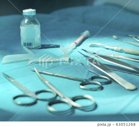 Surgical instruments, silicone nasal implant in operating room. 63051268