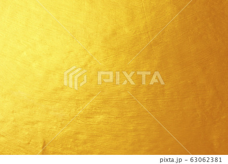 Golden cement wall background 63062381