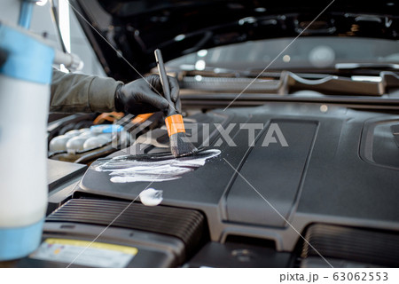 Professional car engine cleaning 63062553