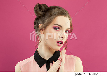 Attractive woman fashion model with trendy makeup Attractive woman fashion model with trendy makeup 63064882