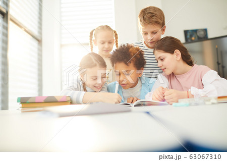 Friends Helping With Homework Friends Helping With Homework 63067310