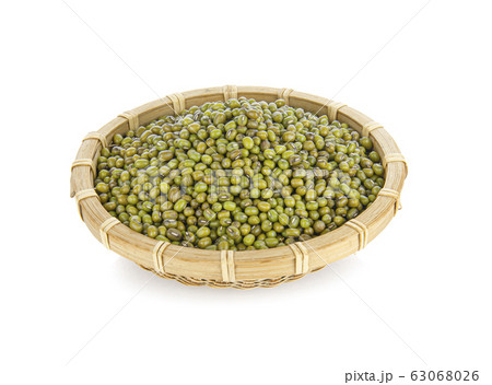 dry mung beans in bamboo basket on white dry mung beans in bamboo basket on white 63068026