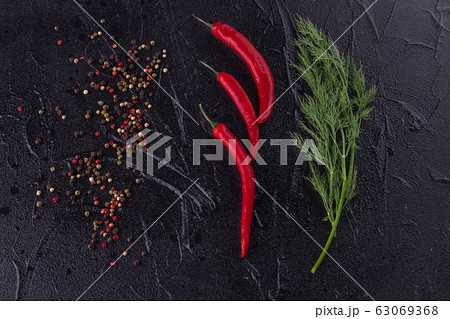 Various condiments, chili pepper and dill. Various condiments, chili pepper and dill. 63069368