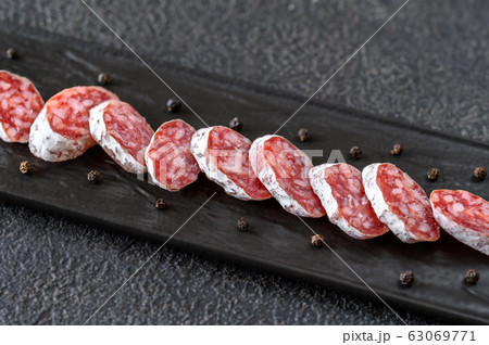 Fuet on the serving plate 63069771