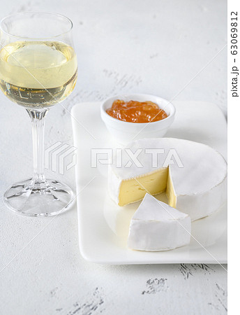 Camembert cheese with glass of wine 63069812