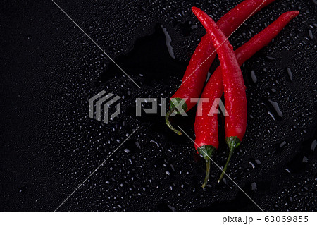 Three peppers as a wholeю 63069855