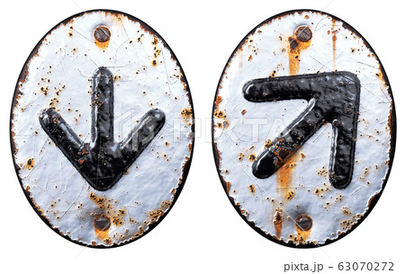 Set of symbols arrow to down and up arrow made of forged metal on the background fragment of a metal surface with cracked rust. Set of symbols arrow to down and up arrow made of forged metal on the background fragment of a metal surface with cracked rust. 63070272