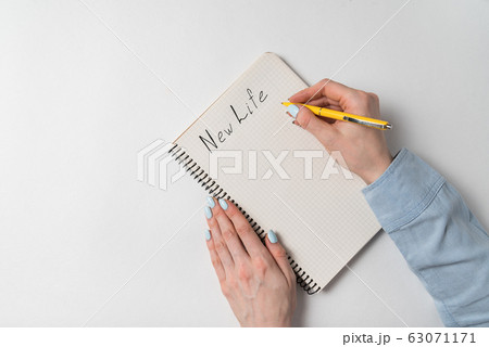 New Life Words written in a notebook on a white 63071171