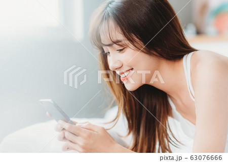 Beautiful woman wake up morning 63076666