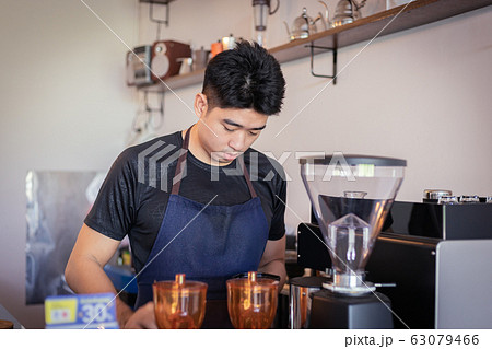 Attractive Asian barista the coffee shop owner 63079466