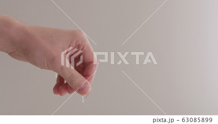 pour shower gel on man hand closeup pour shower gel on man hand closeup 63085899