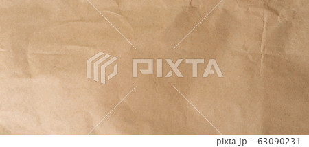 crumpled brown paper background and texture with 63090231