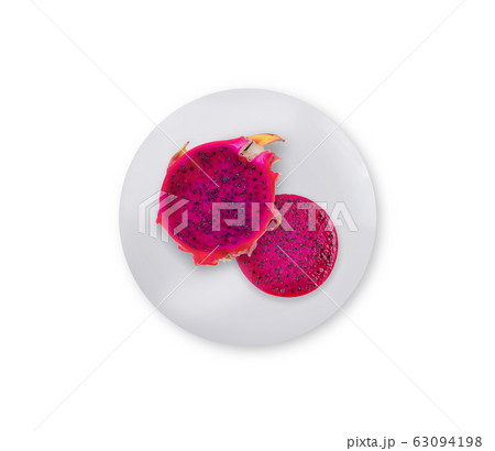 Dragon Fruit top view on white plate Dragon Fruit top view on white plate 63094198