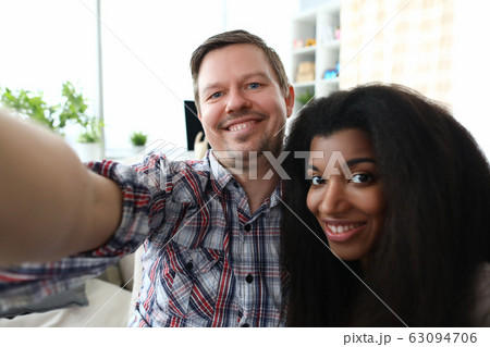 Happy loving people taking picture to remember Happy loving people taking picture to remember 63094706