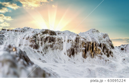 Snowy Mountains peaks on sky background Snowy Mountains peaks on sky background 63095224