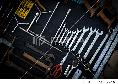 Photo top view a huge set collection of working hand and power tools many for the wooden on isolated black background 63097740
