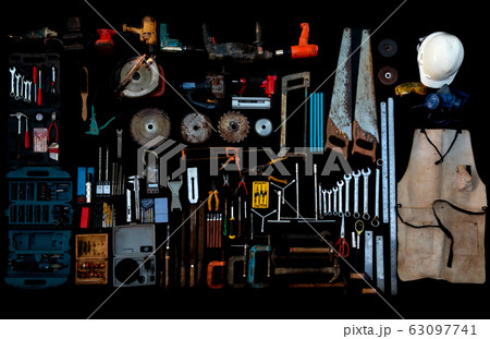 Photo top view a huge set collection of working hand and power tools many for the wooden on isolated black background 63097741