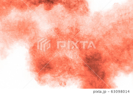 Abstract explosion of orange dust on white Abstract explosion of orange dust on white 63098014