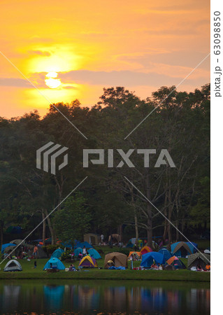 Camping tents by the lake Camping tents by the lake 63098850
