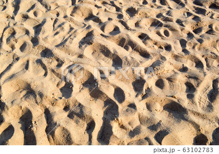 Beautiful yellow airy loose sea sand Beautiful yellow airy loose sea sand 63102783