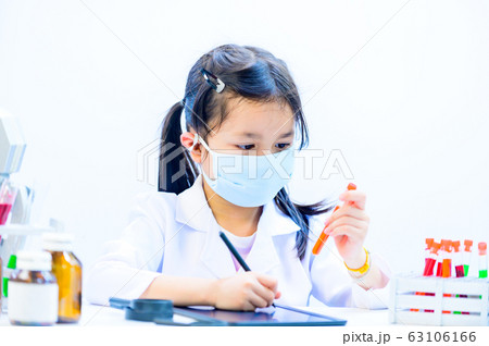 Asian young scientist working in science  63106166