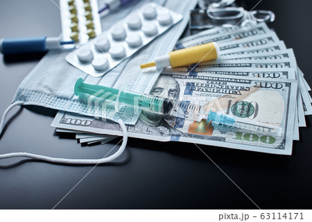 Pills, protective mask, medical items and dollar 63114171