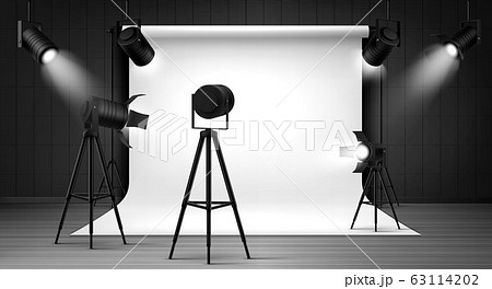 Photo studio with white background and spotlights 63114202