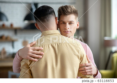 two guys hugging