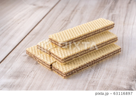 Wafer Biscuits on wooden table. Stock Image Wafer Biscuits on wooden table. Stock Image 63116897