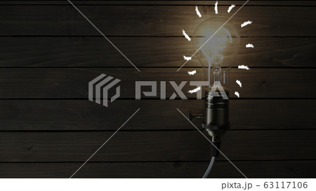 idea light bulb Flickering Tungsten light bulb lamp over black background 63117106