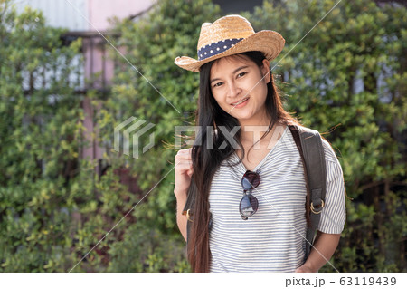 Asian woman traveler backpacker looking for route Asian woman traveler backpacker looking for route 63119439