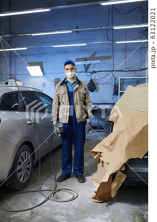 Car Painter Standing In Workshop Car Painter Standing In Workshop 63122021