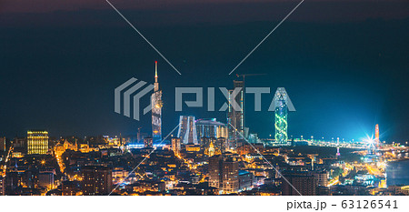 Batumi, Adjara, Georgia. Panorama, Aerial View Of Urban Cityscape At Sunset. Town At Evening Blue Hour time. City In Night Lights Illuminations 63126541