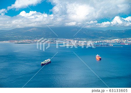 Ocean panorama with boats and harbor 63133605