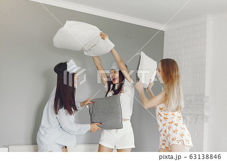 Three girls have pajamas party at home Three girls have pajamas party at home 63138846