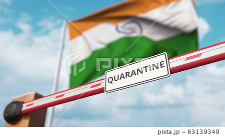 Barrier gate with QUARANTINE sign being closed with flag of India as a background. Indian Border closure or infection related isolation Barrier gate with QUARANTINE sign being closed with flag of India as a background. Indian Border closure or infection related isolation 63139349