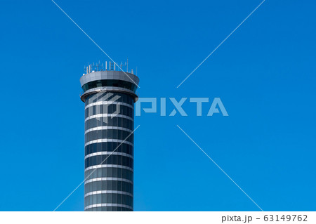 Air traffic control tower in the airport against 63149762