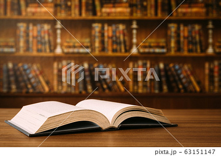 Open book on the desk Open book on the desk 63151147