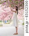 beautiful girl and cherry blossom 63152300
