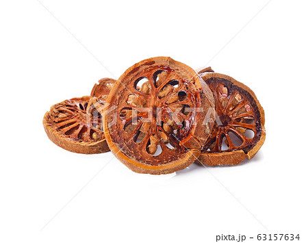 Aegle marmelos. Dry bael fruit on white background 63157634