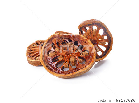 Aegle marmelos. Dry bael fruit on white background Aegle marmelos. Dry bael fruit on white background 63157636