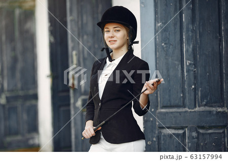 Rider in a sports uniform on a rancho Rider in a sports uniform on a rancho 63157994