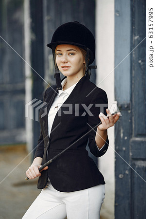 Rider in a sports uniform on a rancho Rider in a sports uniform on a rancho 63157995