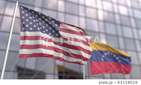 Flying flags of the USA and Venezuela in front of a modern skyscraper. 3D rendering 63158029