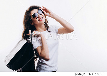 Happy Pretty Girl After Shopping Adjusting Sunglasses Happy Pretty Girl After Shopping Adjusting Sunglasses 63158628
