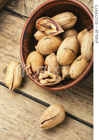 Unshelled pecans nut 63159973