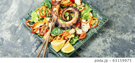 Sea salad with vegetables 63159975